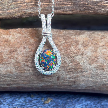 Sterling Silver Drop Style Cluster Pendant with Created Solid Fire Opal and Cubic Zirconia's