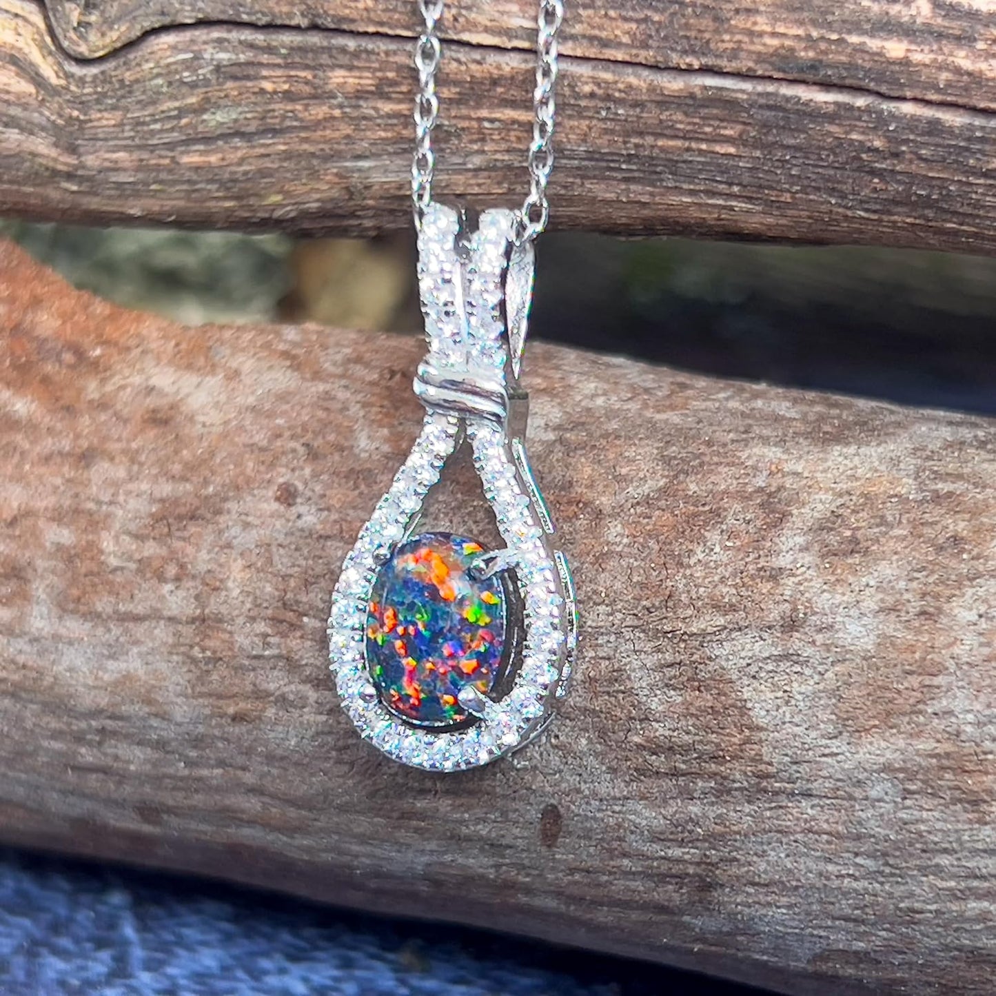 Sterling Silver Drop Style Cluster Pendant with Created Solid Fire Opal and Cubic Zirconia's