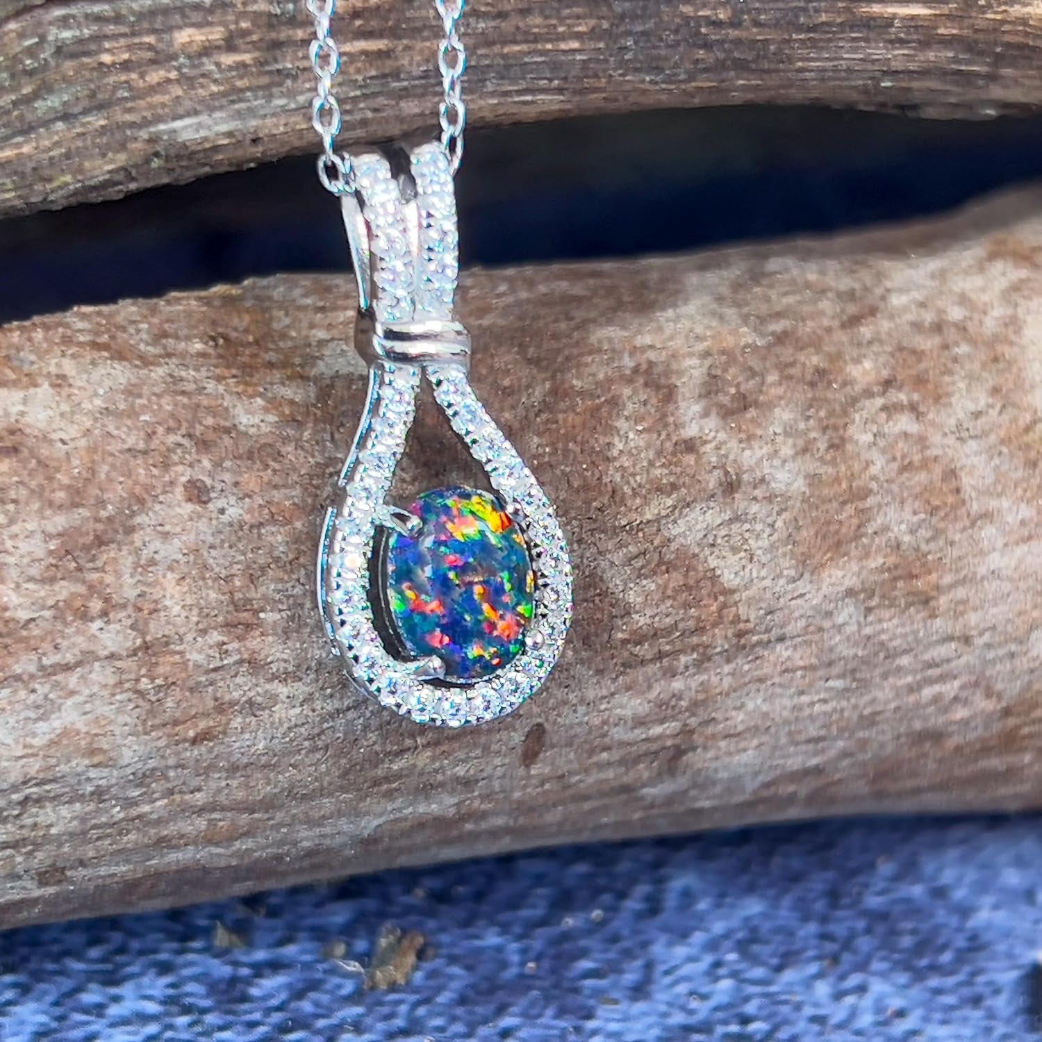 Sterling Silver Drop Style Cluster Pendant with Created Solid Fire Opal and Cubic Zirconia's