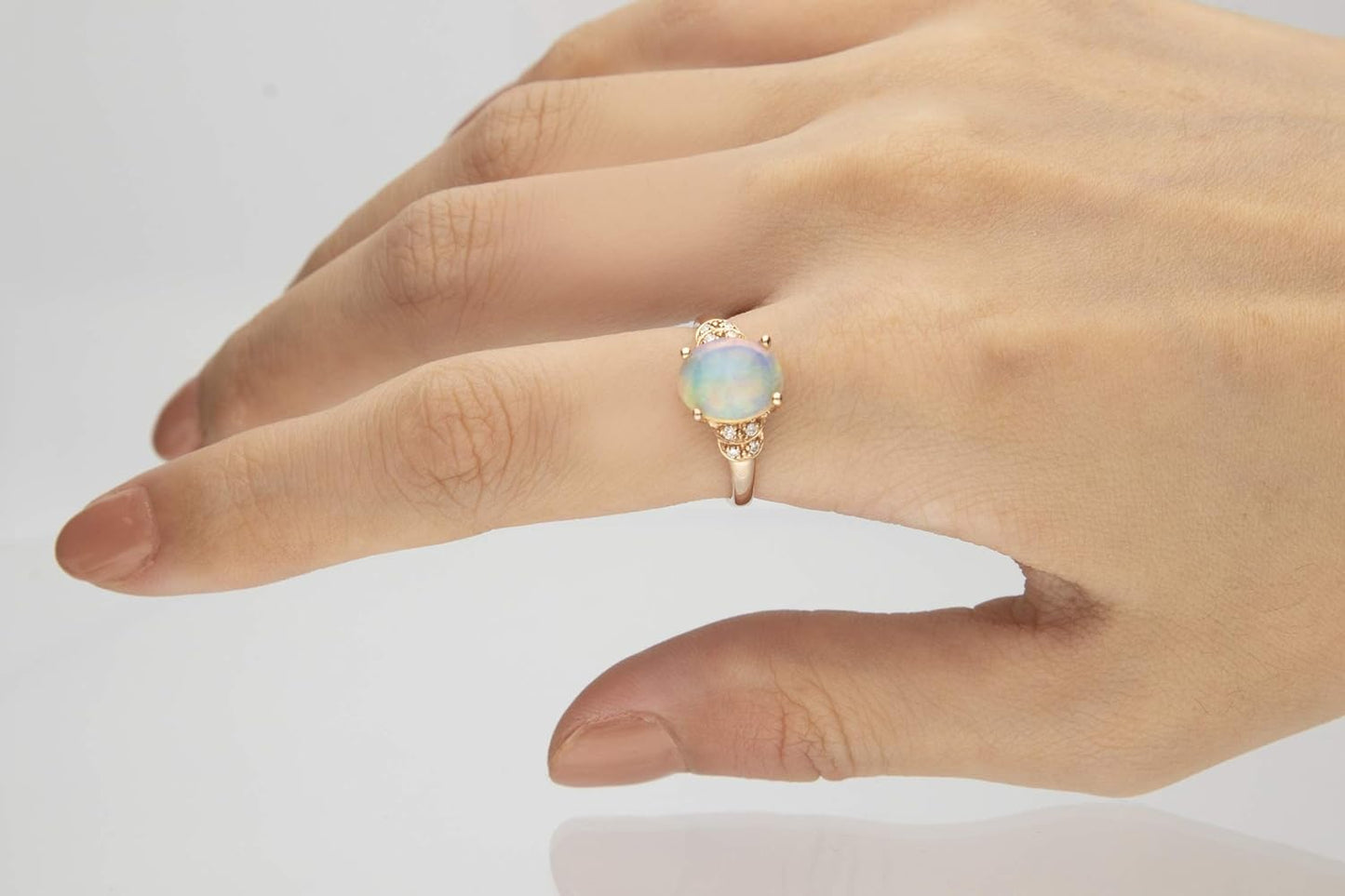 10K Rose Gold Natural Opal Ring with stunning and captivating Diamonds